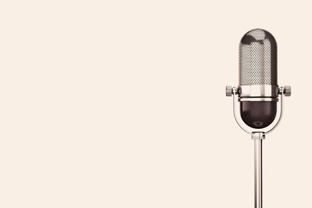 Vintage silver microphone on a white backgroundの写真素材
