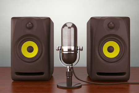 Old Style Photo.  Vintage silver microphone and Audio Speakers on the tableの写真素材