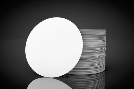 Stack of Blank Beer Coasters on a black backgroundの写真素材