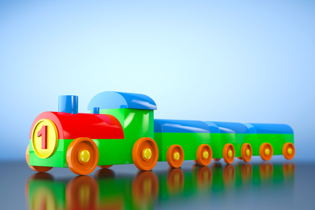 Children Toy Multicolor Plastic Train on a blue background. 3d renderingの写真素材