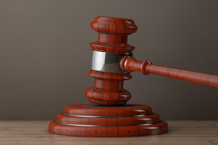 Judge Gavel and Sound Block on a wooden table. 3d Renderingの写真素材