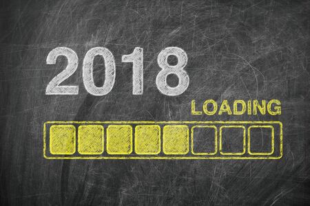 Progress Bar Showing Loading of 2018 New Year on Chalkboard extreme closeupの写真素材