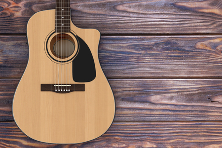 Wooden Acoustic Guitar on a wooden table. 3d Renderingの写真素材