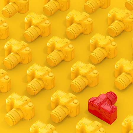 Rows of Yellow Modern Digital Photo Camera with One Red on a yellow background. 3d Renderingの写真素材
