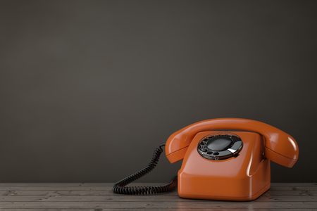 Orange Vintage Styled Rotary Phone on a wooden table. 3d Renderingの写真素材