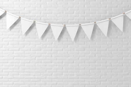 White Empty Party Flags Mock Up Hanging on White Brick Wall Background extreme closeup. 3d Renderingの写真素材