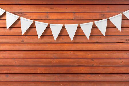 White Empty Party Flags Mock Up Hanging on a Red Wooden Plank Wall Background extreme closeup. 3d Renderingの写真素材