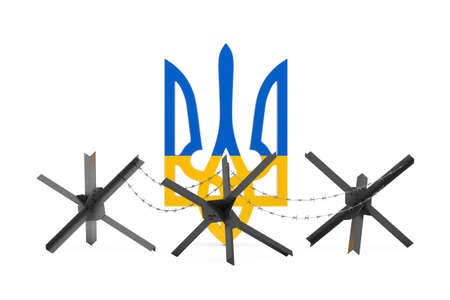 Black Metal Anti Tank Hedgehog Defense Barrage with Barbed Wire in Front of Coat of Arms with Flag...