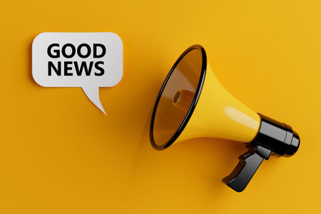 Yellow Megaphone with Good News Sign on a Speech Clouds Chat Bubble on a yellow background. 3d renderingの写真素材