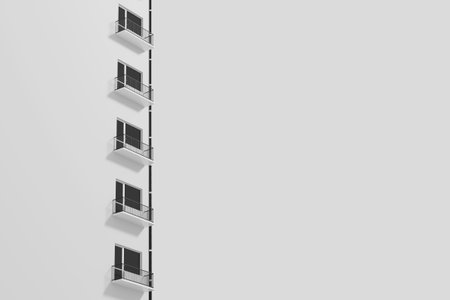Modern Architecture and Simplicity Concept. Minimalist Building Facade Featuring a Vertical Row of...