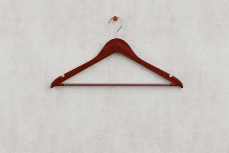 Premium Natural Red Wooden Hangers with Non Slip Bar on a White Concrete Wall background. 3d renderingの写真素材