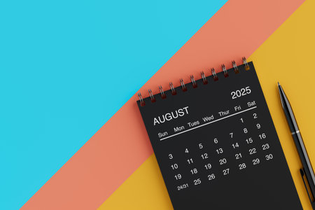 Black Flip Monthly August 2025 Business Calendar with Black Pen on a yellow, blue and orange background. 3d renderingの写真素材