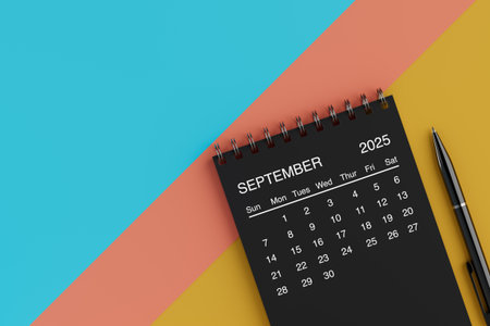 Black Flip Monthly September 2025 Business Calendar with Black Pen on a yellow, blue and orange background. 3d renderingの写真素材