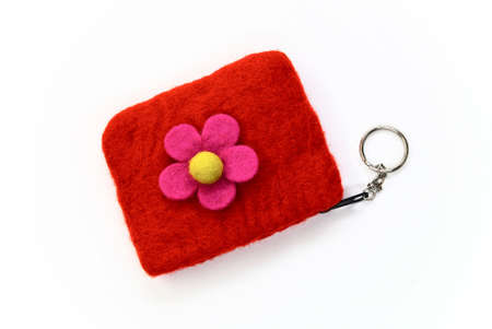 Red woollen purse on whiteの写真素材