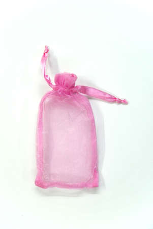 small pink bag on a white backgroundの写真素材