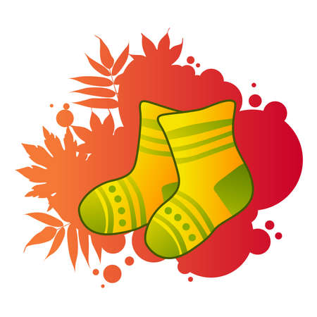 yellow knitted socks on autumnal backgroundのイラスト素材