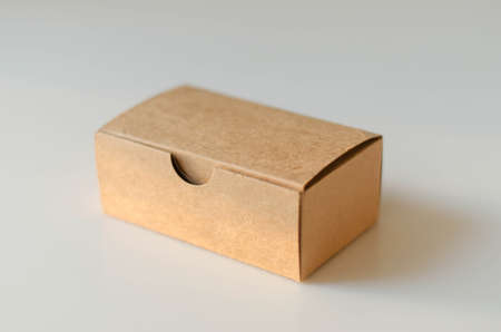 The box is made of paper in broun colored using for pack card of something else