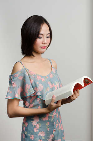 Girl reading and action with her books in leisure timeのeditorial素材
