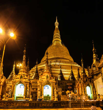 Shwedagon Pagoda in myanmar they are beautiful gold color at the daynightの写真素材