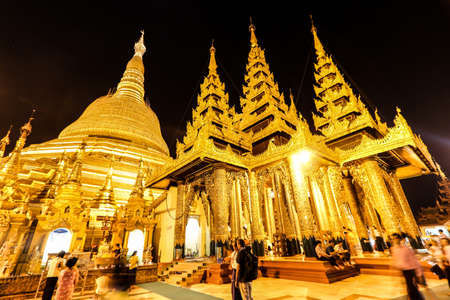 Shwedagon Pagoda in myanmar they are beautiful gold color at the daynightの写真素材