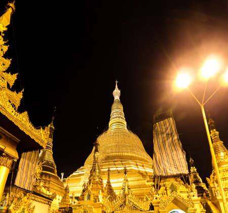Shwedagon Pagoda in myanmar they are beautiful gold color at the daynightの写真素材
