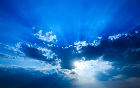 Beautiful dramatic sky with sun rays.の写真素材