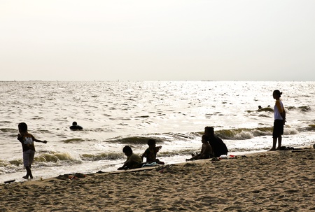 CHONBURI, THAILAND - JUNE 02 : People enjoy boating, swimming and diving on June 02, 2012 in Bangsean Beach,Chon Buri, Thailand.の写真素材