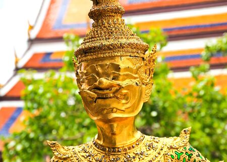 Golden statue in Wat Phra Keao in the Grand Palace in Bangkok Thailand