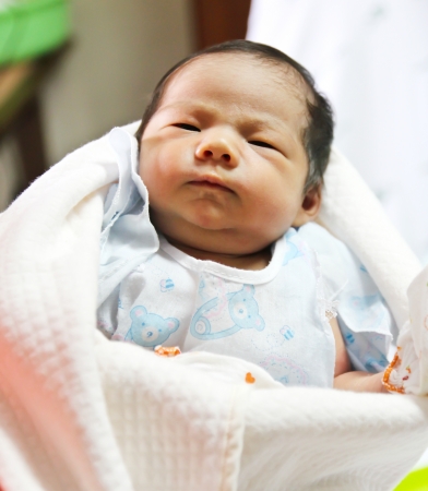 Newborn Asian baby girl sleepingの写真素材