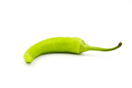 Green chili pepper isolated on a white backgroundの写真素材