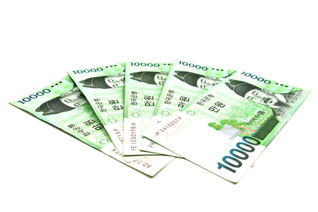 Korean Won currency bills isolated on white background.の写真素材