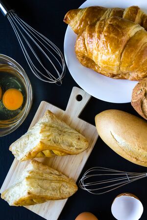 Homemade breads or bun on wood background,  breakfast food