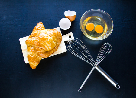 Homemade breads or bun on wood background, croissant puff , breakfast foodの写真素材