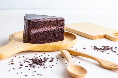 Chocolate Cake on wooden plate.の写真素材