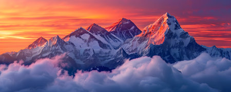 A stunning panoramic view of a majestic mountain range its snow capped peaks reaching up towards the heavens The rugged rocky terrain is blanketed in a pristine layer of snow reflecting the warmの素材