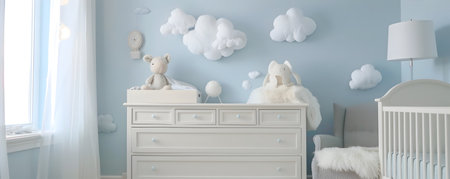 Elegant and soothing nursery design featuring a white dresser and whimsical cloud shaped wall art creating a calming and inviting atmosphere for a baby s roomの素材