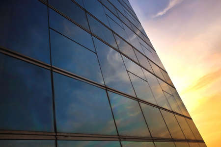 window reflection at sunset time as backgroundの写真素材