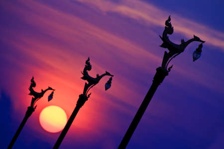 Sunset and swan statueの写真素材