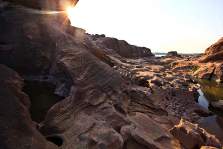 sunset at Sam Phan Bhok Grand Canyon, Mekhong river, Ubon Ratchathani, Thailand の写真素材