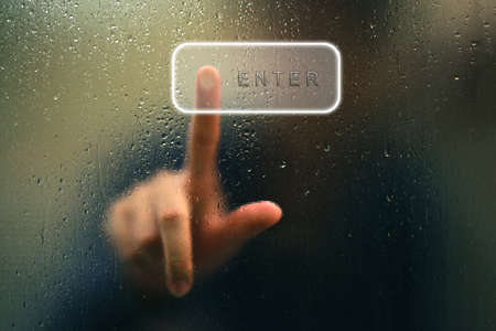 finger point as blur and water drop as abstract styleの写真素材