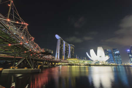 SINGAPORE - MAY 13 2012: World's most expensive standalone casino property at US$ 6.3 billion. Marina Bay Sands Hotel dominates the skyline at Marina Bay May 13, 2010 in Singapore.のeditorial素材