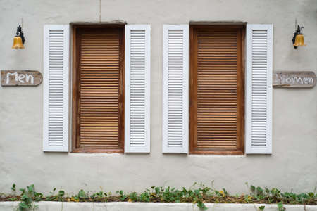 Twin wooden windowの写真素材