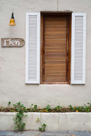 Twin wooden windowの写真素材