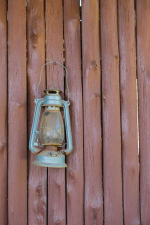Classic lamp on wooden backgroundの写真素材