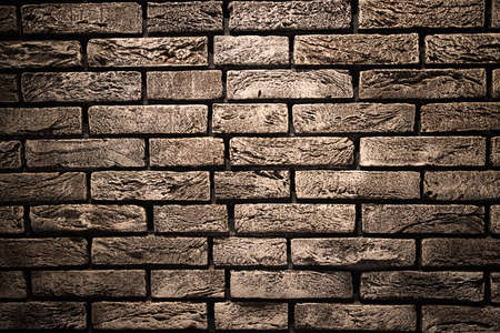 Vignette brick wall texture as backgroundの写真素材