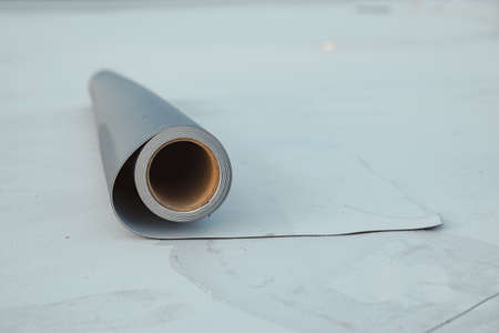 Roofing PVC membrane in rolls placed on the roof of the siteの写真素材