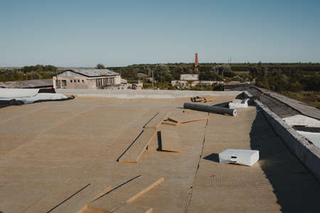 Basalt wool placed on the roof to be covered with membrane.の写真素材