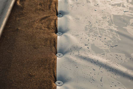 Pvc membrane fastened with dowels.Rubber roofing membrane waterproofの写真素材