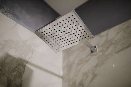 Shower head in a modern style bathroom.の写真素材