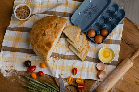 Bakery - gold rustic crusty loaves of bread. Still life captured from above (top view, flat...